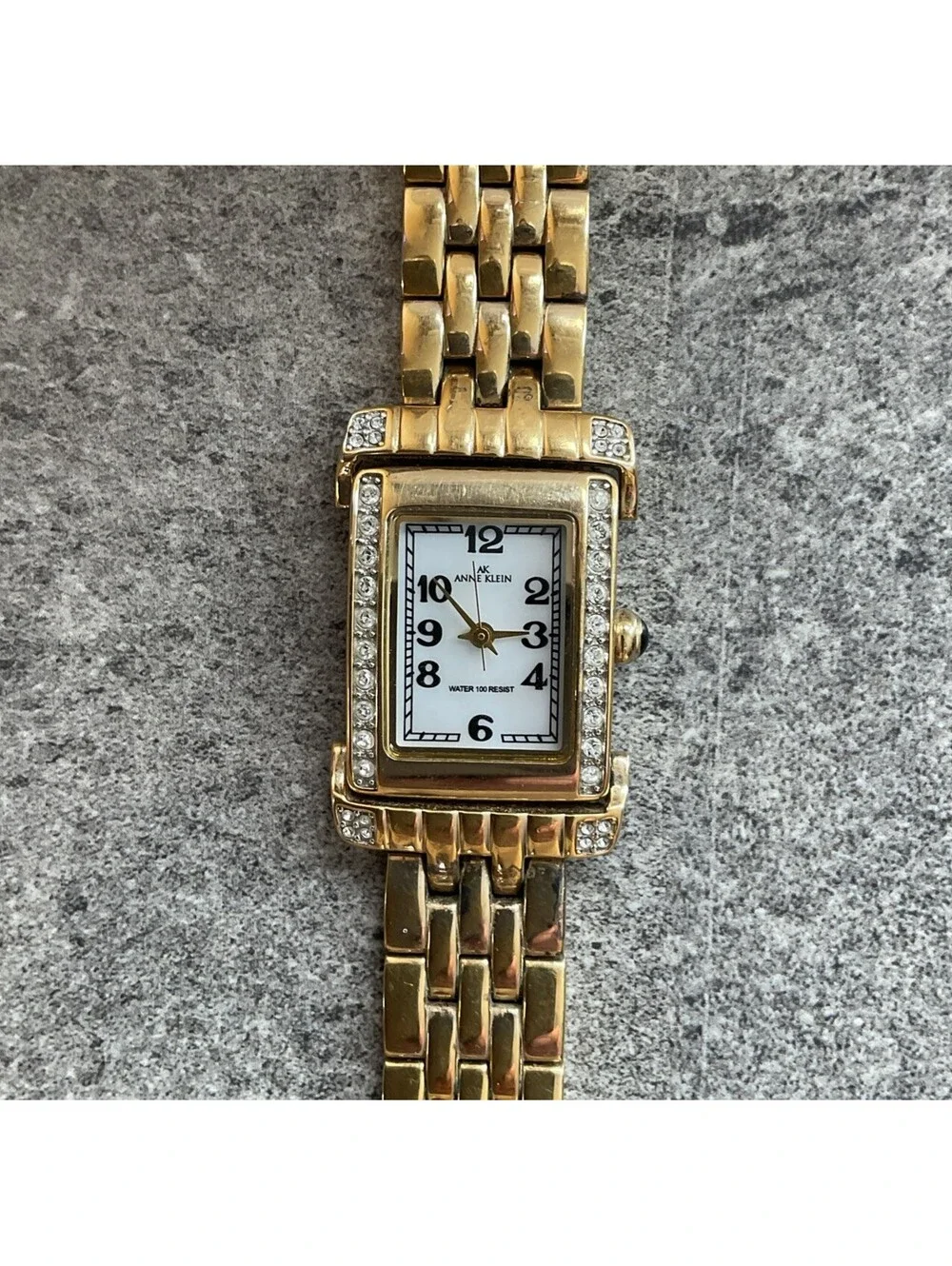 Anne Klein Womens Tank Style Watch 25mm Gold Tone Case & Band MOP Dial Bin O